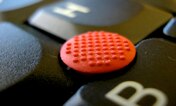 Typical “nub” pointing stick embedded in a PC laptop keyboard Image of typical “nub” pointing stick embedded in a PC laptop keyboard