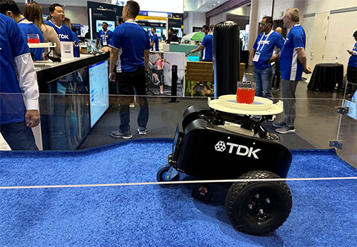 Robot navigating bumpy terrain while tilt compensating so no liquid was spilled)