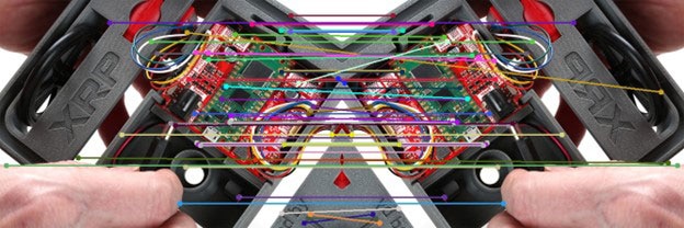 Lines indicating the feature matches on two inverted images using FLANN