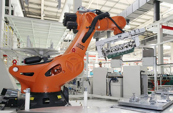 Industrial robotic arm assembling cylinder block