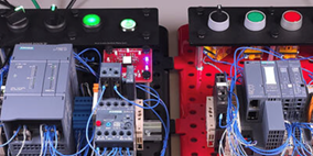 DIN Rail mounted PLC devices and wiring with control buttons