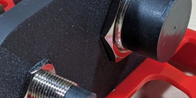 A pair of Omron EB2 proximity sensors are mounted on a 3D printed base.