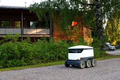 Image of mobile robot making a delivery