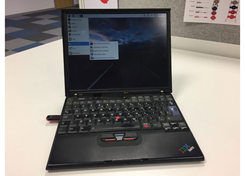 PIXEL OS installed on an old IBM Laptop
